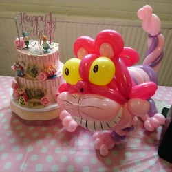 Alice in wonderland theme balloon and cake