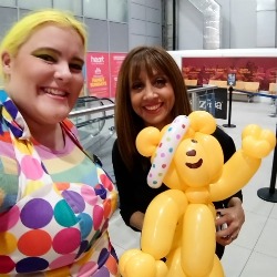 Balloon twisting for children in need with Riz Lateef and Pudsey Bear
