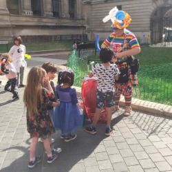 Children queueing for a balloon in London