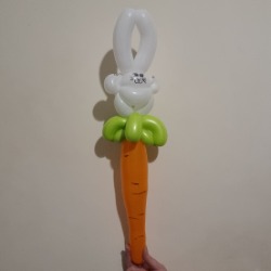 Balloon twisting design of a rabbit on a carrot