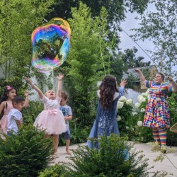 Giant bubbles at a garden party in London