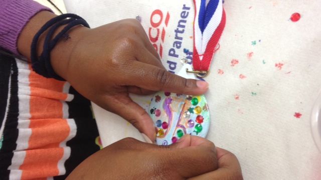 Craft making medals for a children's event in London