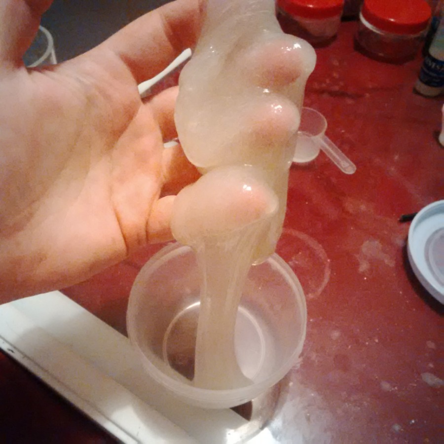 Clear gloopy slime made at a slime party