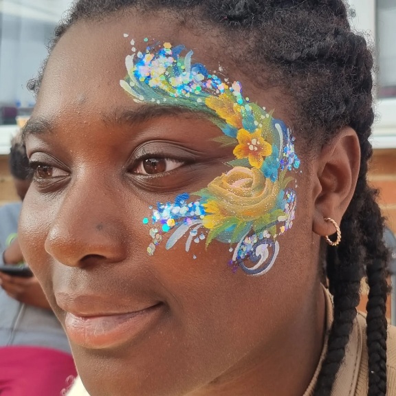 Flowers with glitter face paintng eye design