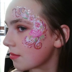 Bat Mitzvah Face Paint flower eye design with glitter