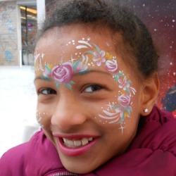 Face painting station at a shopping centre school holiday event