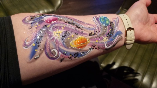 Glitter and glam painting of the solar system with shimmer and glitter highlights