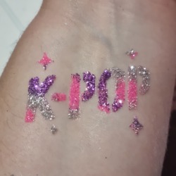 K-pop glitter tattoo from a themed party